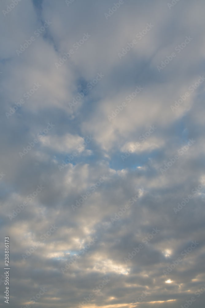 Clear bright blue sky with sunny clouds - perfect for background. Blue, white pastel heaven in soft focus. Simple shot of peaceful and beautiful nature. Opened, minimalist view out of windows. - Image