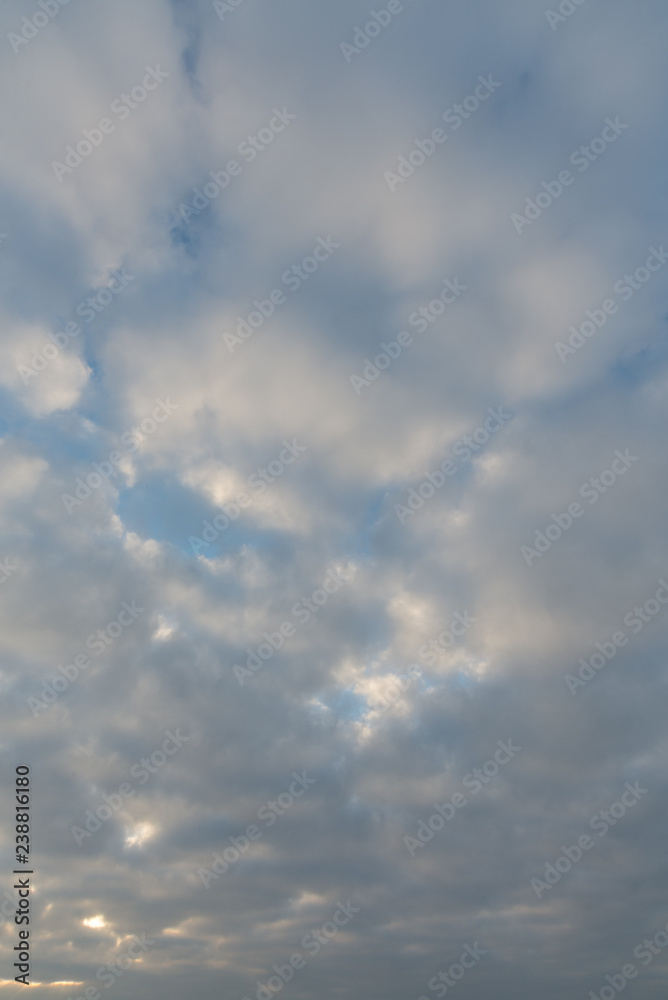Clear bright blue sky with sunny clouds - perfect for background. Blue, white pastel heaven in soft focus. Simple shot of peaceful and beautiful nature. Opened, minimalist view out of windows. - Image