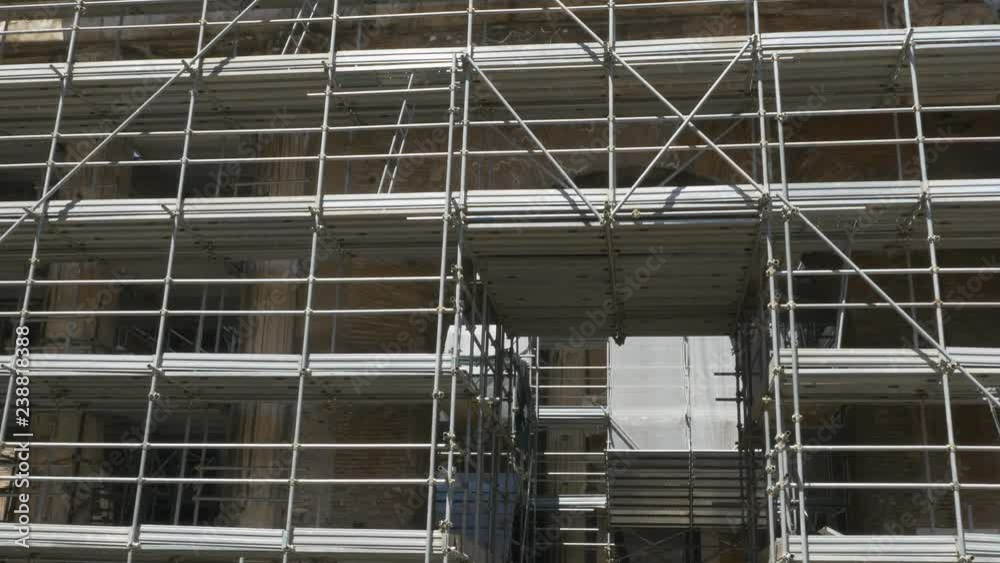 Scaffolding outside old building. Rome, Italy. Scaffolding outside old building. Rome, Italy.