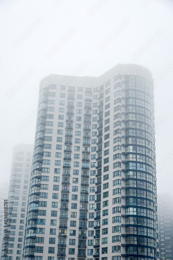 multi-storey house in the fog multi-storey house in the fog