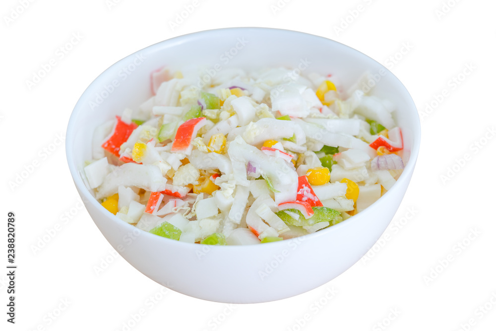 Salad with corn and crab sticks isolated on white background. Selective focus Salad with corn and crab sticks isolated on white background. Selective focus