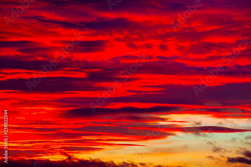 Picturesque dramatic colorful vibrant sunset sky with clouds