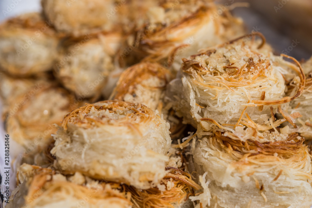 Bird’s nest knafeh kunafa arabic arab sweet dessert food at a street food market Bird’s nest knafeh kunafa arabic arab sweet dessert food at a street food market
