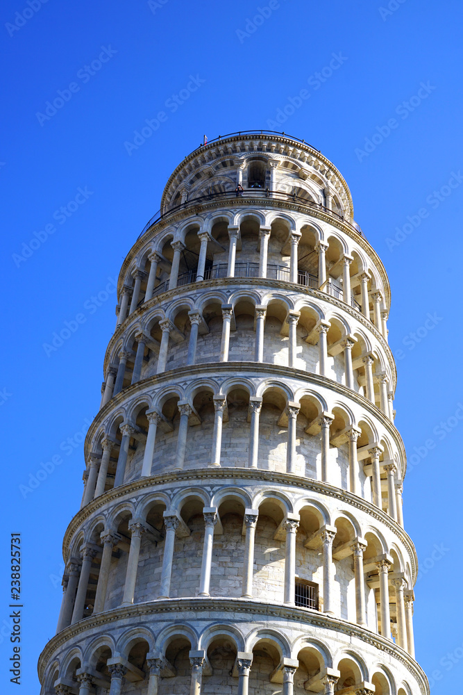 Day view of the Leaning Tower of Pisa campanile in Tuscany, Italy