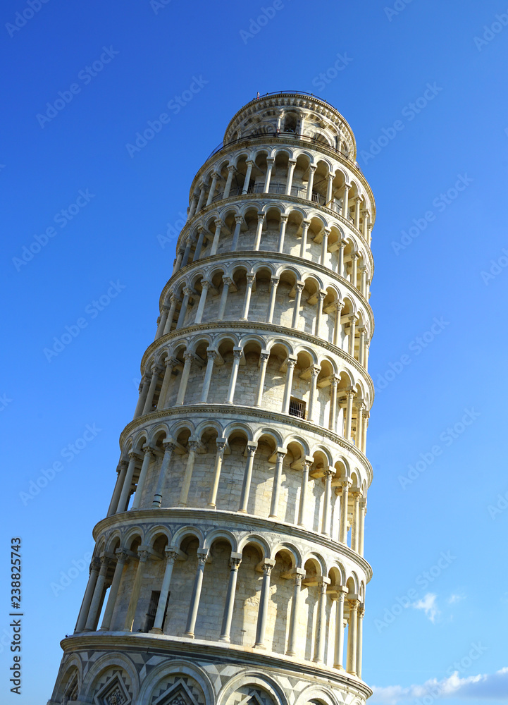 Day view of the Leaning Tower of Pisa campanile in Tuscany, Italy