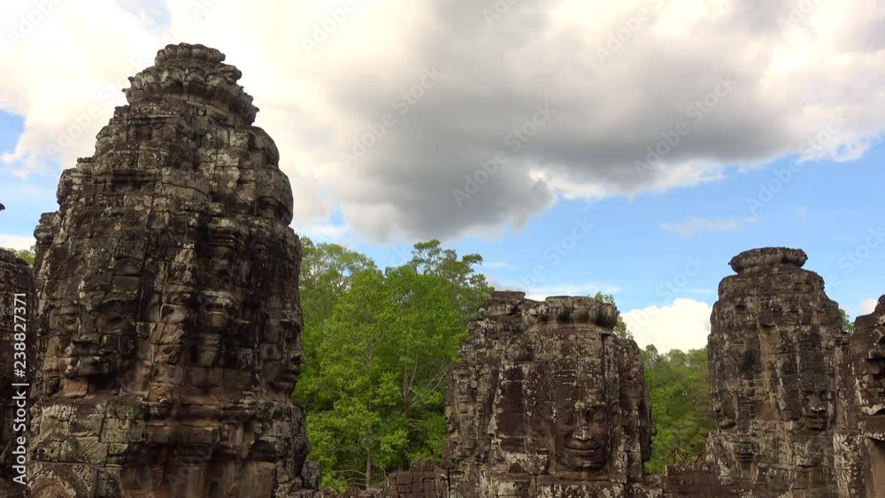 Faces of Bayon temple in Angkor Thom, Siemreap, Cambodia. The Bayon Temple (Prasat Bayon ) is a richly decorated Khmer temple at Angkor , ancient architecture in Cambodia Faces of Bayon temple in Angkor Thom, Siemreap, Cambodia. The Bayon Temple (Prasat Bayon ) is a richly decorated Khmer temple at Angkor , ancient architecture in Cambodia