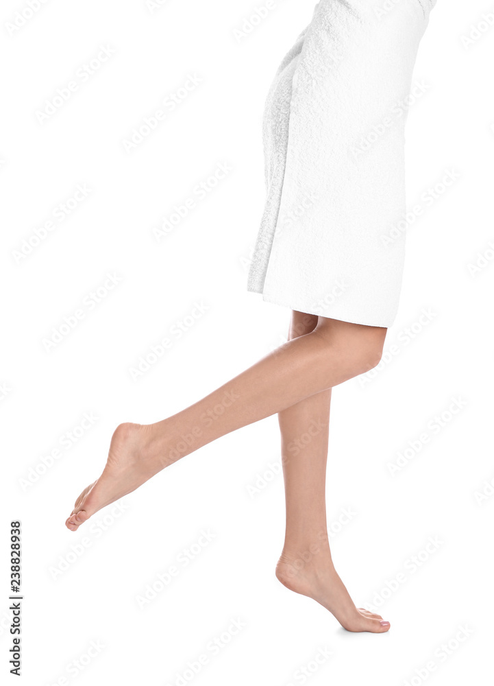 Woman with beautiful legs and feet on white background, closeup. Spa treatment Woman with beautiful legs and feet on white background, closeup. Spa treatment