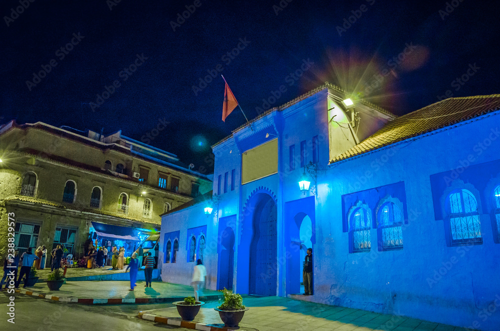 Naklejka premium Beautiful street of city Chefchaouen at night in Morocco, Africa.