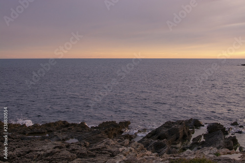 Rugged natural green and rocky coastline by Mediterranean sea