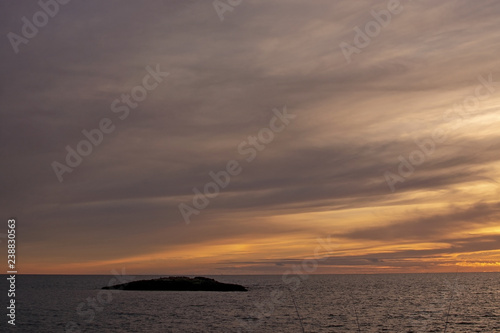Sunset over the Mediterranean through cloudy winter skies © artesiawells