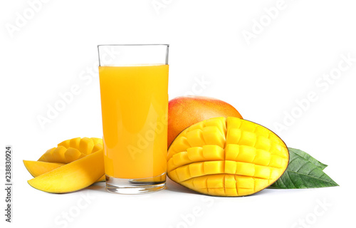 Fresh tropical mango juice and fruits, isolated on white