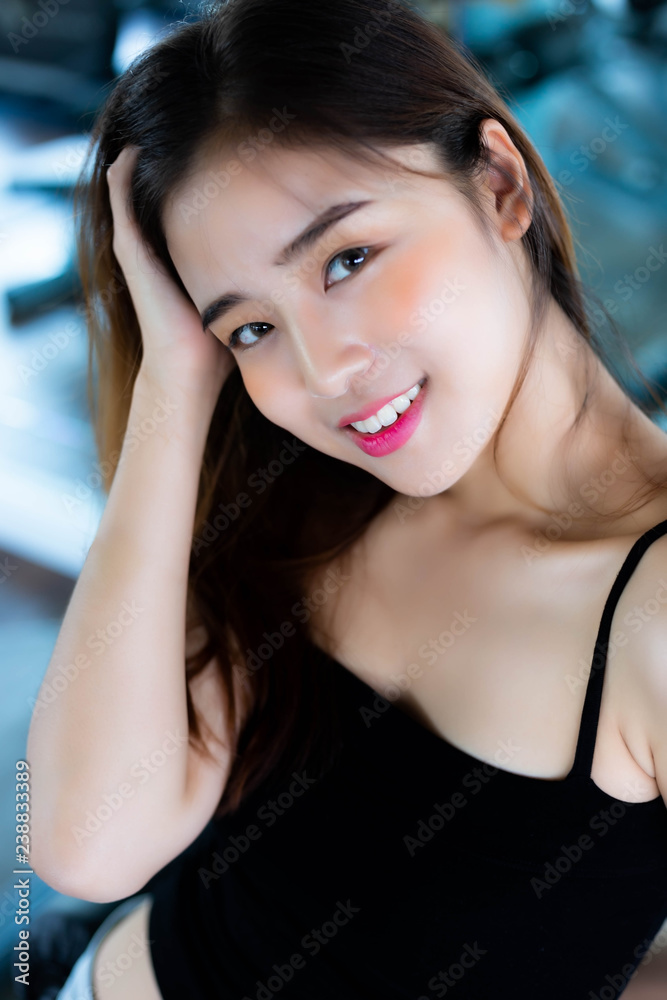 Portrait charming beautiful woman. Attractive beautiful sexy girl feel relax, happy with smiley face. Glamour woman has beautiful face, nice skin. Asia woman has good health, look after herself well