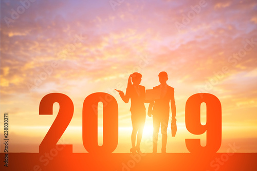 silhouette of people with 2019