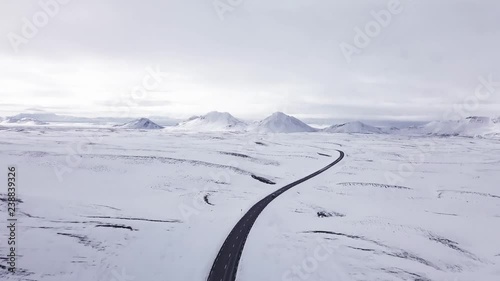 Flying with the drone over a mountain pass in Iceland photo