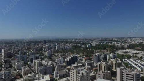 Wide aerial panoramic panning shot over the center of Nicosia Cyprus photo