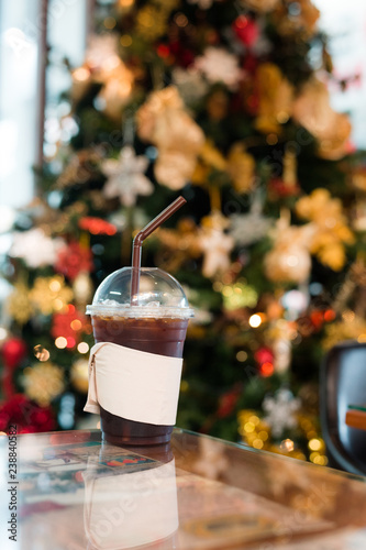 ice black coffee and bokeh lighting in christmas holidays