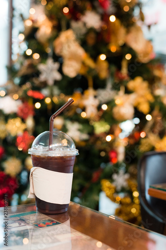 ice black coffee and bokeh lighting in christmas holidays