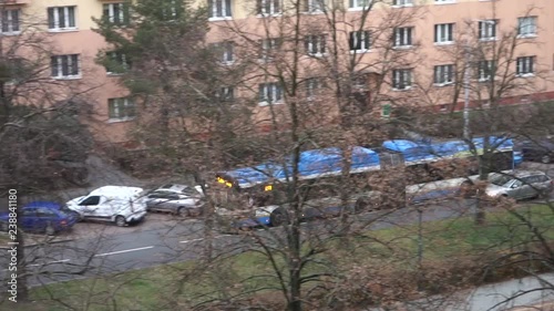 Solaris Urbino 18M articulated bus of the DPO company in Ostrava driving on the Hlavni trida street. The video is taken with slight motion blur effect photo