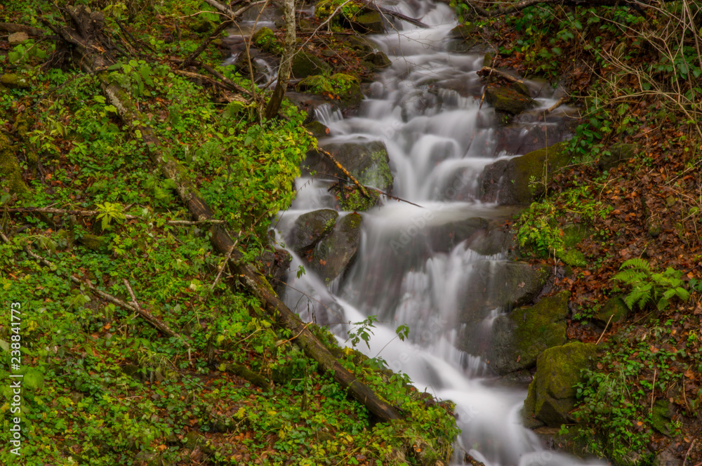 Waterfall on the stream in the forest. Otryt. Bieszczady Mountains. Waterfall on the stream in the forest. Otryt. Bieszczady Mountains.