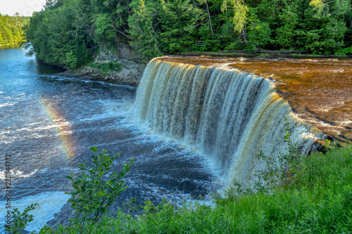 Upper Tahquamenon Falls in summer as sunset approaches. Taquamehnon Falls is in Michigan's upper peninsula,  photo