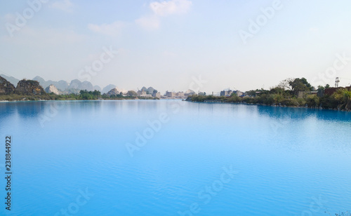 Tuyet Tinh Coc lake , Natural color Crystal Blue lake at Trai Son mountain, Hai phong, Vietnam © Akarat Phasura