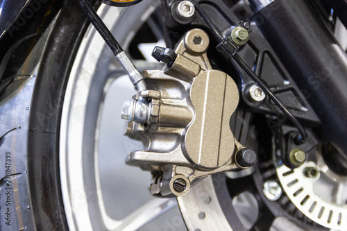 close up - Detail Motorcycle brake disc is part of the motorcycle. © piyaphunjun