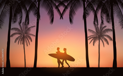 Silhouette couple surfer walking and carrying surfboard on beach with palm tree under sunset sky background