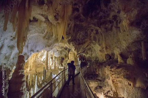 Giant Stalactite and Stalagmite Formations into the Cave at Frasassi Caves, Marche, Italy