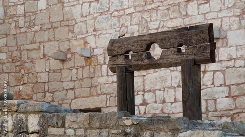 Footage of old wooden scary empty Punishment board, pillory photo