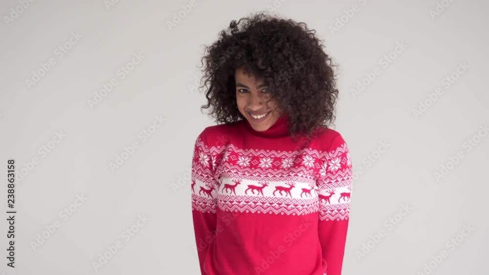 Happy woman giving Christmas present Happy woman giving Christmas present