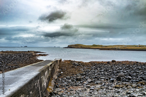 The jetty at Camus Mor at the coastline of north west Skye by Kilmuir - Scotland, United Kingdom photo