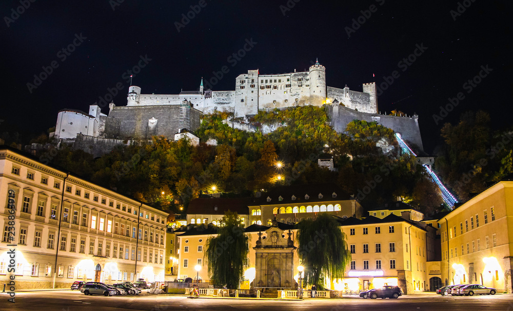 Beautiful view on illuminated Salzburg Castle during Austrian fall night