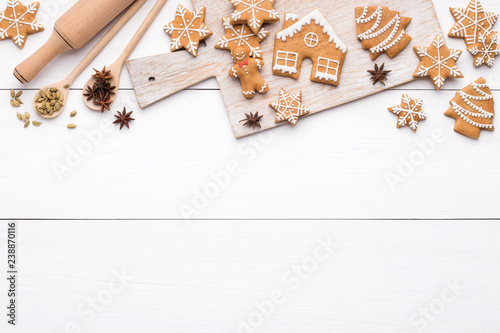 Christmas gingerbread sweets, spices on cutting board