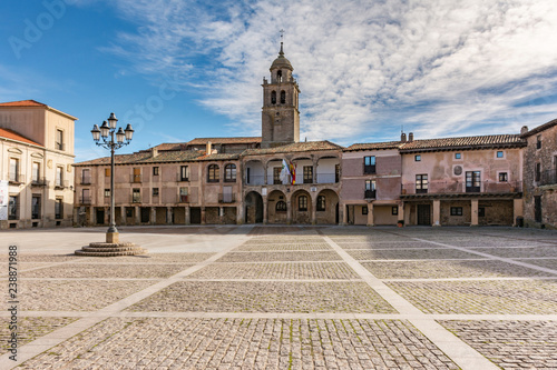 Main square of Medinaceli. This wide closed Castilian square, porticoed and almost pentagonal (Soria, Spain) photo