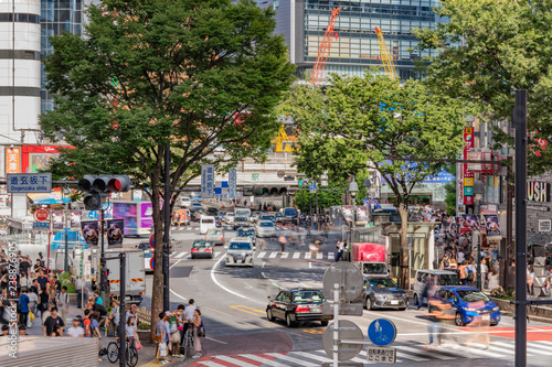 Photography TOKYO, JAPAN - August 21 2018: Shibuya Crossing Intersection in front of Shibuya Station on a bright day