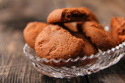 Wallpaper Mural Cookies filled with chocolate cream in crystal bowl on old wooden table Torontodigital.ca