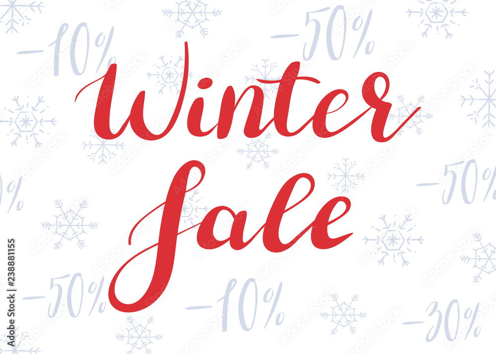 Winter sale. Lettering on the background of snowflakes and discounts
