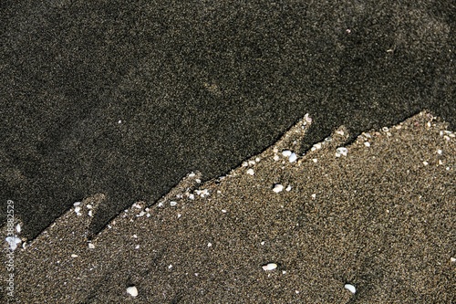 sand of different colors on the beach