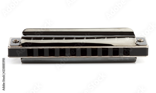 Diatonic harmonica isolated closeup.