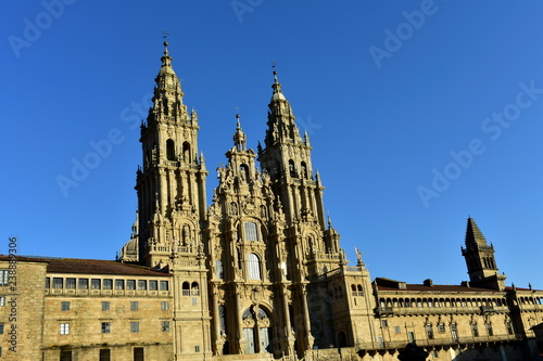 Cathedral with sunset light and clean stone. Obradoiro Square, baroque facade and towers. Santiago de Compostela, Spain.