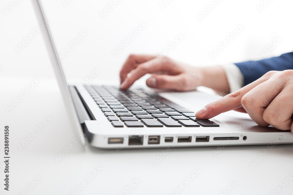Close Up of businessman hands using laptop computer Close Up of businessman hands using laptop computer