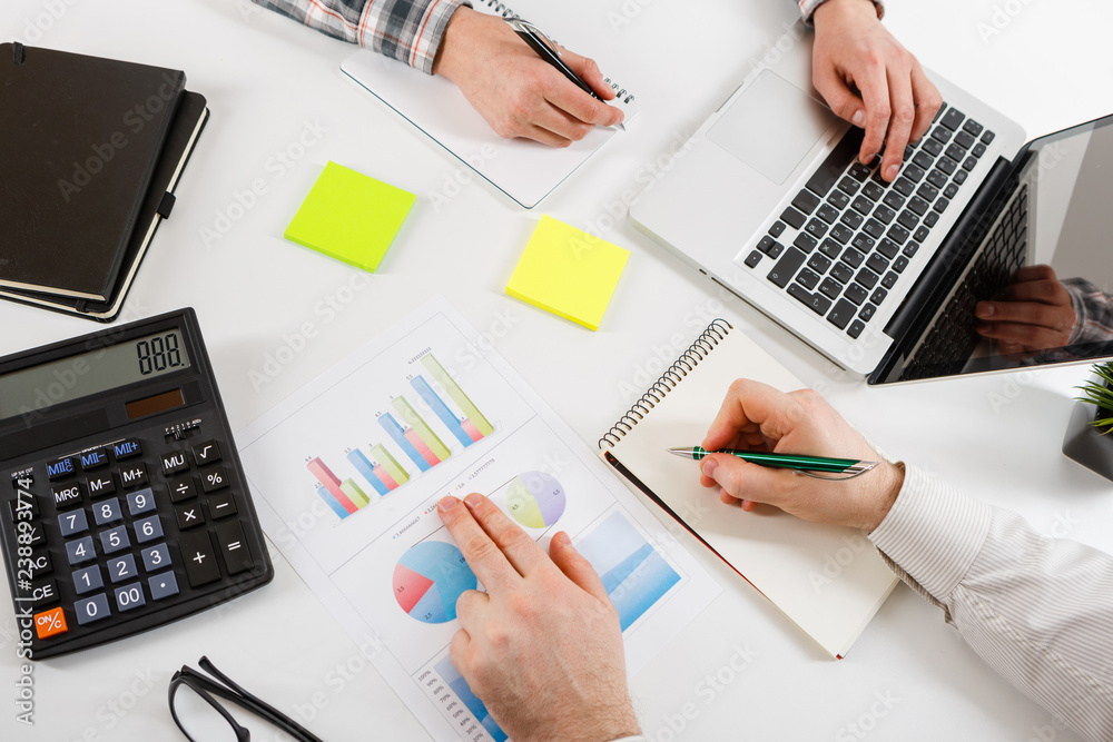Business concept. Two business mans working and meeting with chart at office on his desk. Business concept. Two business mans working and meeting with chart at office on his desk.