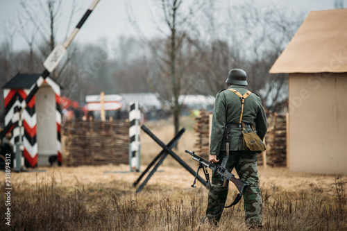 Re-enactor Dressed As World War II German Soldier Holding Zb-30 