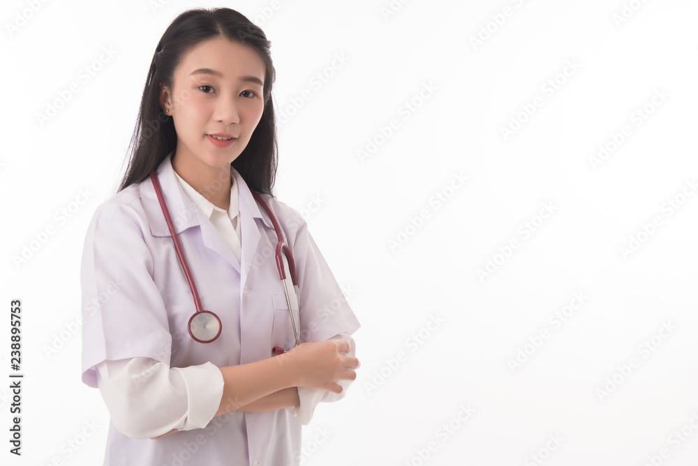 Portrait of happy beautiful young asian woman doctor standing with arms crossed look at camera over white background. Free from copy space. Portrait of happy beautiful young asian woman doctor standing with arms crossed look at camera over white background. Free from copy space.