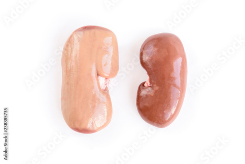 Raw pork kidneys isolated on white background.