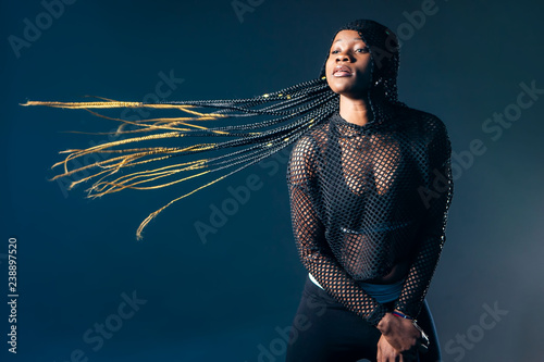 Girl in motion. African bra...