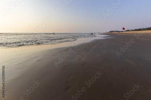 Sunset on Mandrem beach in Goa, India. photo