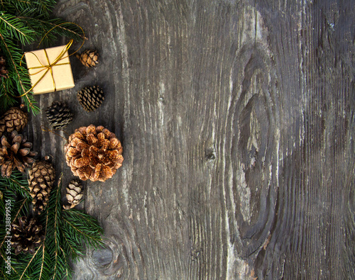 Christmas gift boxes on a rustic wooden background