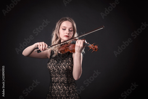 Portrait of a young violinist photo