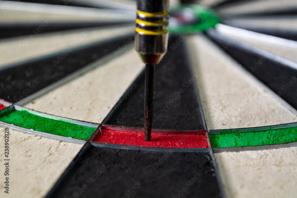 Darts sticking in Dartboard Stock Photo Adobe Stock